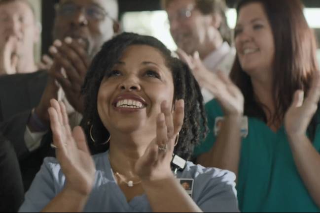 Clapping MUSC employees.