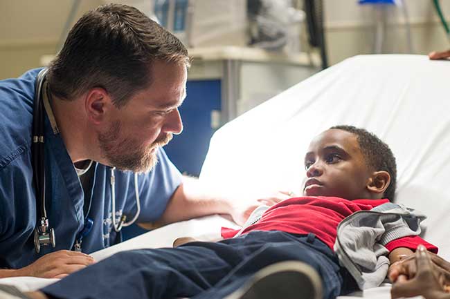 MUSC Children's Health care team member with emergency patient