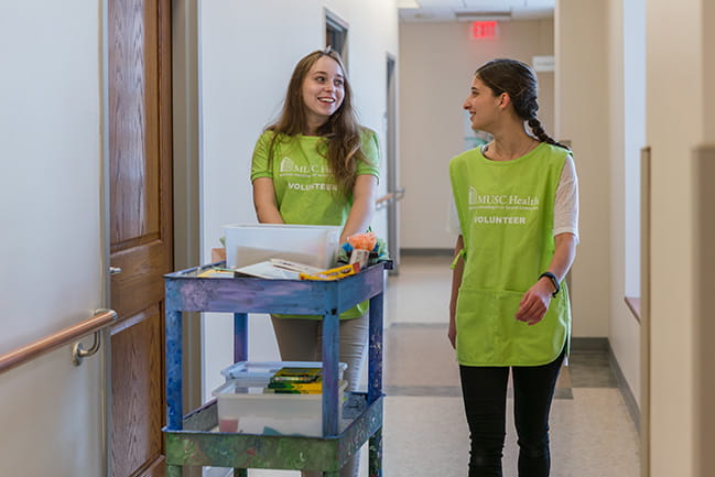 Volunteers Sara and Autumn
