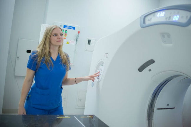 Image of team member using imaging equipment